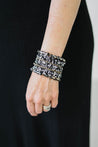 Statement bracelet with black and gold beads