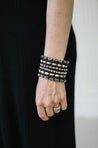 Statement bracelet with black beads and diamond accents 