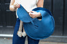 blue leather circle bag with insert
