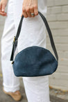 small navy seude bag