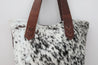 Cowhide and leather tote