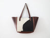 Leather tote with cowhide accent