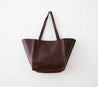 Leather tote with cowhide accent