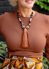 black and brown chunky necklace with large leather tassel