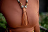 black and brown chunky necklace with large leather tassel