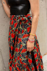 red and black leaf patterned wrap skirt