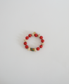 Red and beige bracelet with African focus bead.