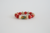 Red and beige bracelet with African focus bead.