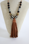 black and brown chunky necklace with large leather tassel